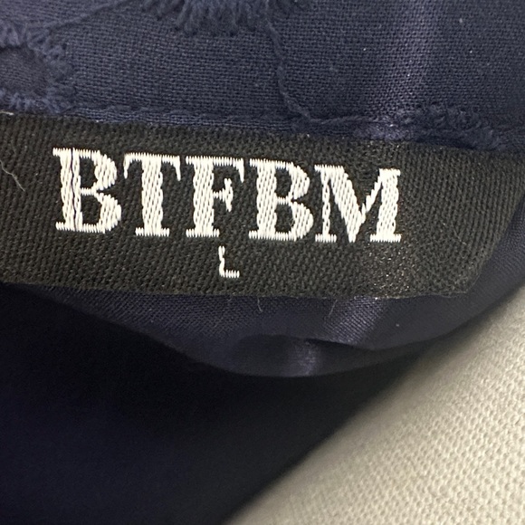 Elegant Navy Eyelet Mini Dress - Picture 2 of 12